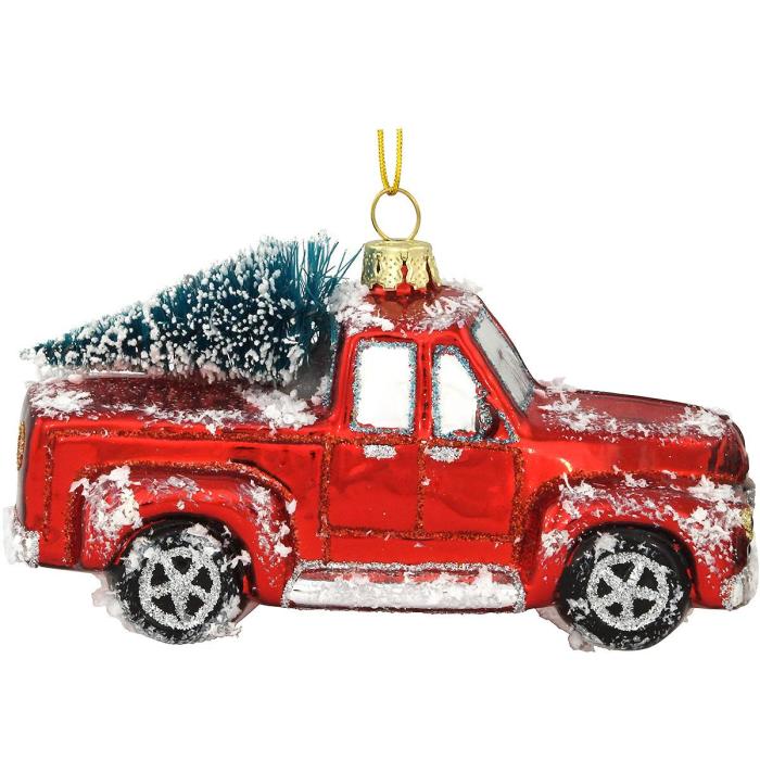 Red truck with christmas tree ornament