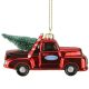 Red truck with christmas tree ornament